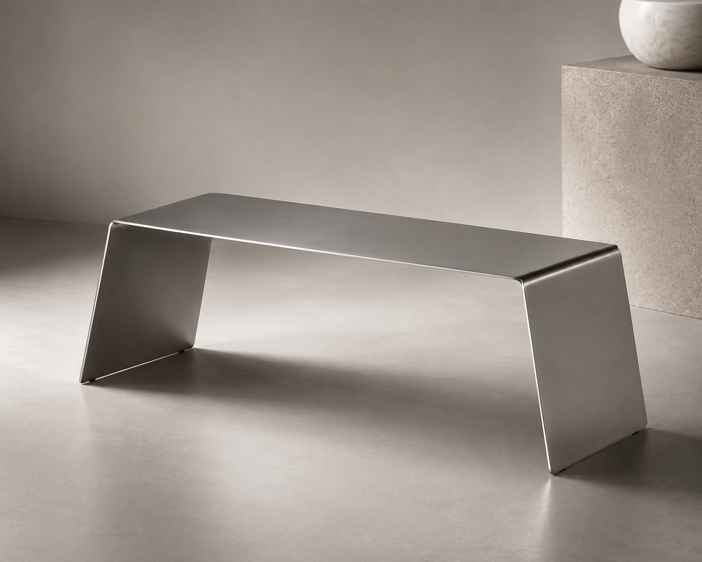 WE FORM SPACE Minimal folded stainless steel bench with angled side supports