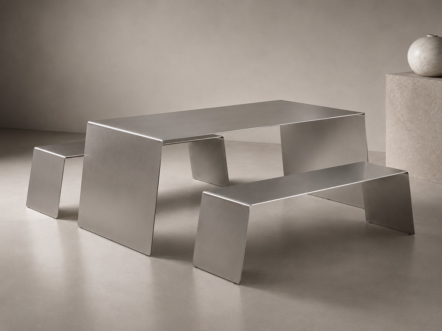 WE FORM SPACE Matt stainless steel dining table with matching benches